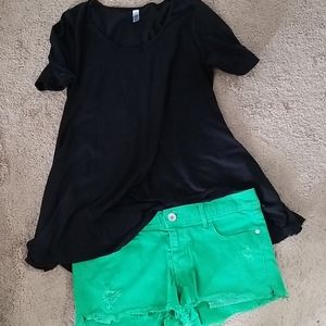 Distressed green Express jean shorts